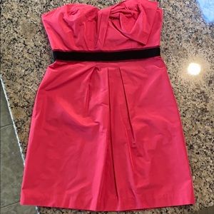 Pink BCBG MaxAzria dress with black detail.